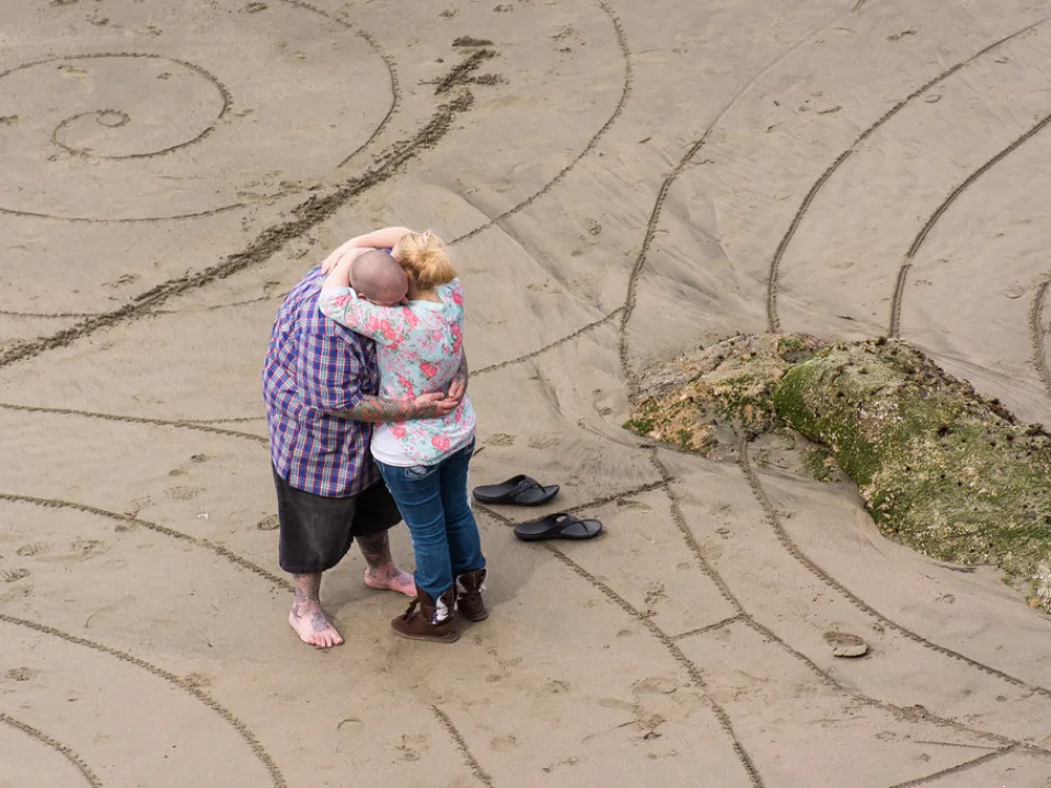 Couple Hugging on the Beach